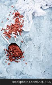dry goji berries on a table, stock photo