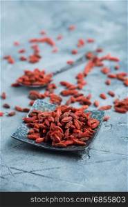 dry gojy berries on a kitchen table