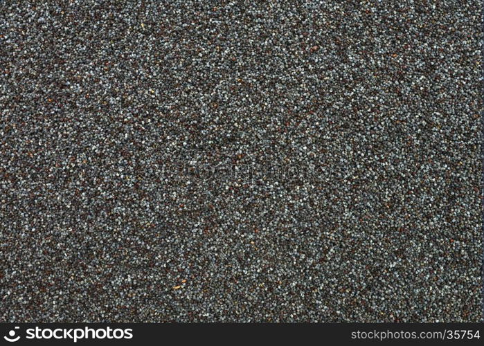 Dry gray poppy seeds texture pattern food background