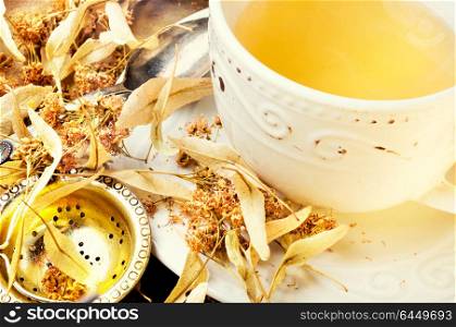 Dry linden leaf. Mug of herbal tea with linden flowers.Healing tea.Herbs tea