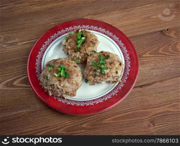 Dry meatballs with green onions. close up