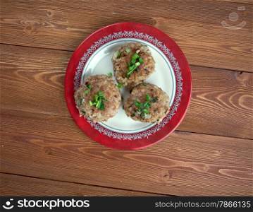 Dry meatballs with green onions. close up