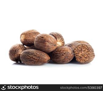 Dry nutmeg spice isolated on white backgsound