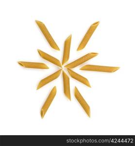 Dry penne pasta in snowflake formation isolated on white background.