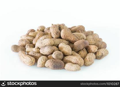 Dry roasted peanuts isolated on white background.