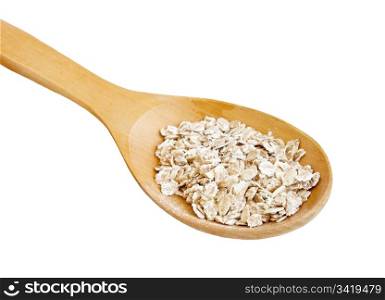 Dry rolled oats in wooden spoon over white background