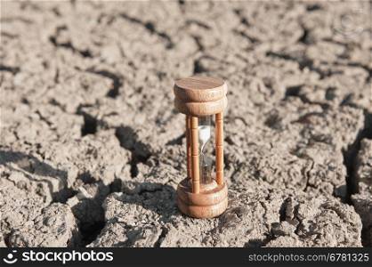 Dry soil texture of a barren land with sand-glass