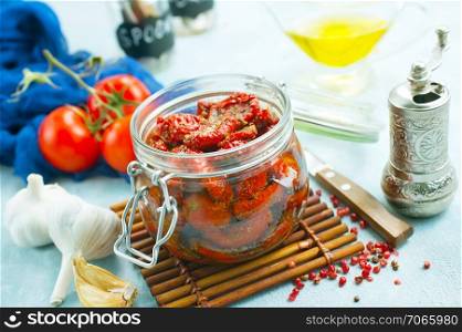 dry tomato with garlic and oil, stock photo