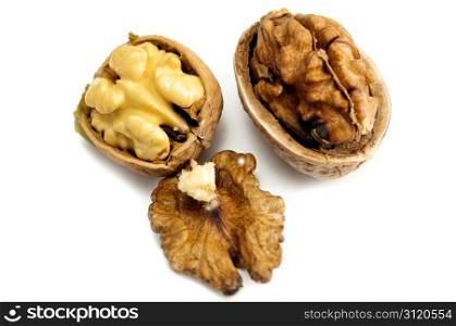Dry walnuts on a white background