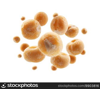 Dry yellow peas levitate on a white background.. Dry yellow peas levitate on a white background