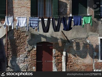 Drying clothes at the sun in italy