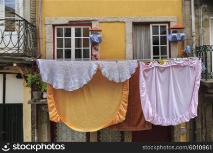 Drying linen hanging outside of house, Porto, Portugal