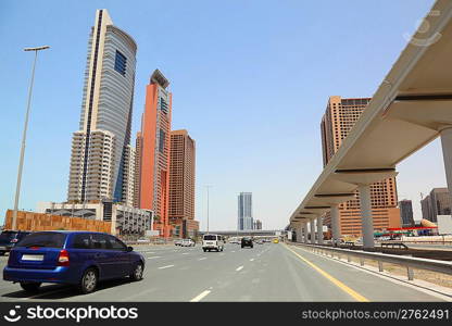 DUBAI - APRIL 18: trunk road and skyscrapers on April 18, 2010 in Dubai, UAE. Dubai is the most fast-growing city on the Earth.