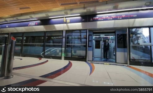 DUBAI - APRIL 25: Dubai Metro With Passengers. Most Comfortable Subway In The World. HD Video