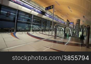 DUBAI - APRIL 25: Dubai Metro With Passengers. Most Comfortable Subway In The World. HD Video