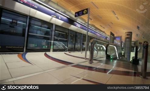 DUBAI - APRIL 25: Dubai Metro With Passengers. Most Comfortable Subway In The World. HD Video