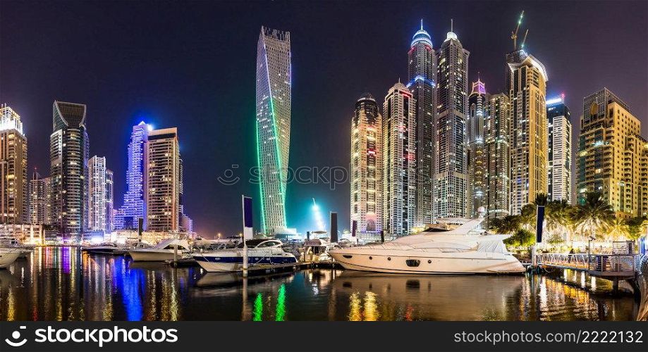 Dubai downtown night scene with city lights, luxury new high tech town in middle East. Dubai Marina cityscape, UAE.