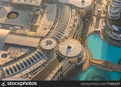 Dubai mall roof golden sunrise morning scene. Top view from above