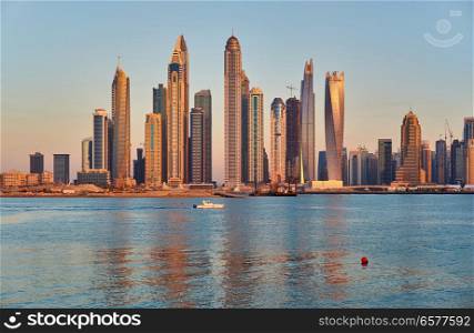 Dubai marina sunset skyline in United Arab Emirates