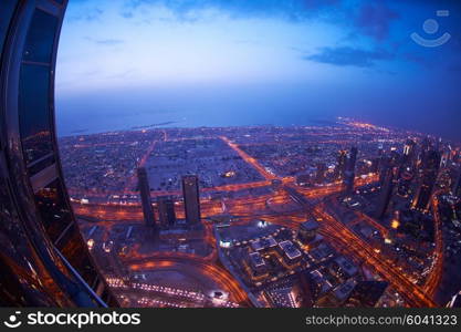 Dubai night skyline. Dubai streets by night. Al Yaqoub tower Dubai. Dubai Millennium Plaza. Dubai Sheikh Zayed Road by night. Dubai night view. Dubai cityscape by night. Dubai metro station view.