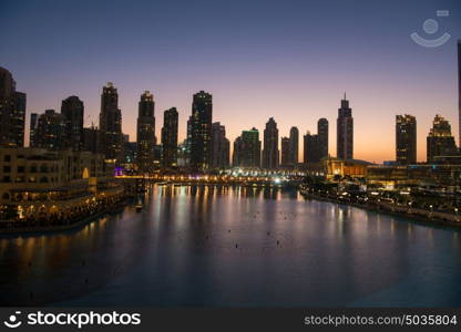 DUBAI UAE 31 JANUARY 2017 famous musical fountain in Dubai with skyscrapers in the background on a beautiful summer evening