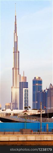 Dubai, UAE - FEBRUARY 2018:Vertical panorama of Burj Khalifa as viewed from the Dubai water canal