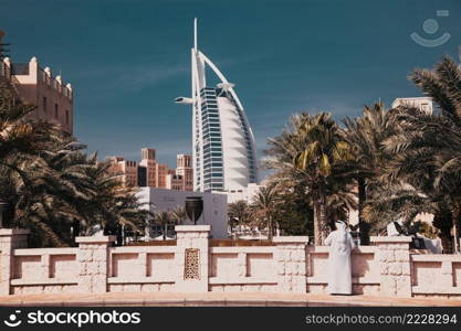 DUBAI, UAE - FEBRUARY, 2018  View on Burj Al Arab, the world only seven stars hotel seen from Madinat Jumeirah, a luxury resort which include hotels and souk spreding across over 40 hectars.
