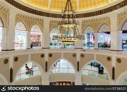 DUBAI, UAE - NOVEMBER 9, 2013: Inside modern luxuty mall . At over 12 million sq ft, it is the world&rsquo;s largest shopping mall based on total area.