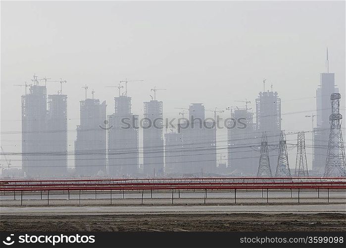 Dubai, UAE, partial view of Dubai?s skyline from Nad Al Sheba Camel Racetrack