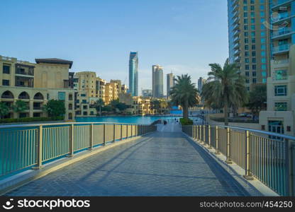 Dubai, United Arab Emirates, 15.11.2015 Sunny day in Urban city, water and buildings. It's a travel photo.