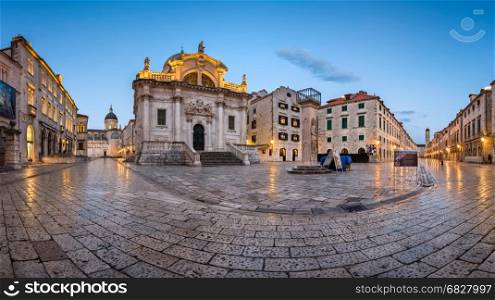DUBROVNIK, CROATIA - JULY 1, 2014: Panorama of Luza Square and Saint Blaise Church in Dubrovnik. In 1979, the city of Dubrovnik joined the UNESCO list of World Heritage Sites.