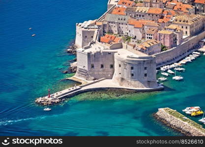 Dubrovnik harbor entrance strong defense walls aerial view, saint Ivan fortress, Dalmatia region of Croatia