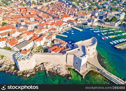 Dubrovnik historic town and harbor aerial view, tourist destination in Dalmatia, Croatia