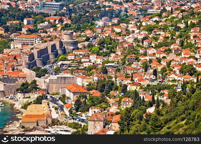 Dubrovnik waterfront houses and strong city walls view, Dalmatia region of Croatia