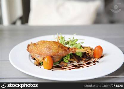 Duck confit , Roasted duck with blueberry sauce
