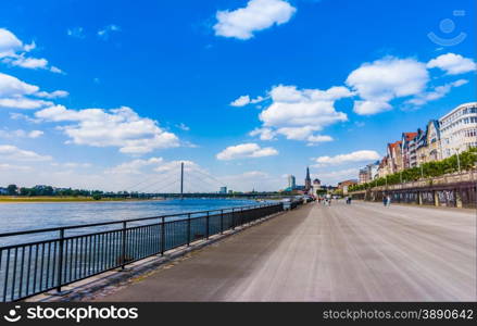 Duesseldorf skyline with Rheinturm and river