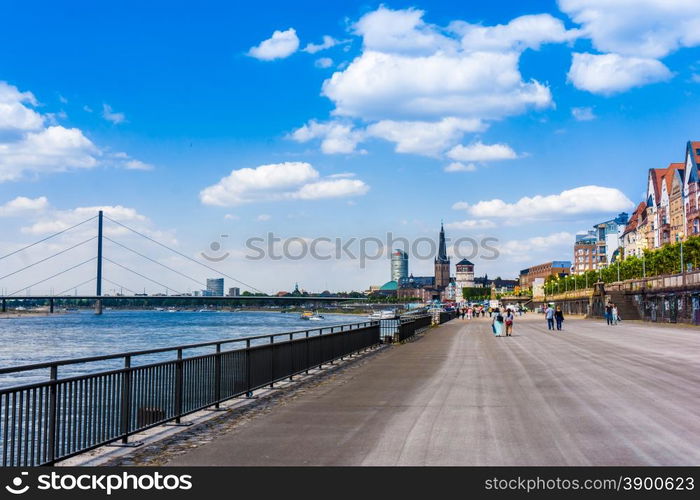 Duesseldorf skyline with Rheinturm and river