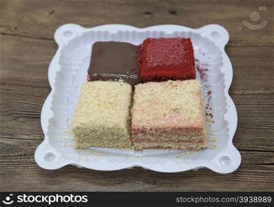 Dukan Diet. Set of cake, Red Velvet, Napoleon cake ,Carrot cake fresh delicious diet cake at Dukan Diet on a wooden background.