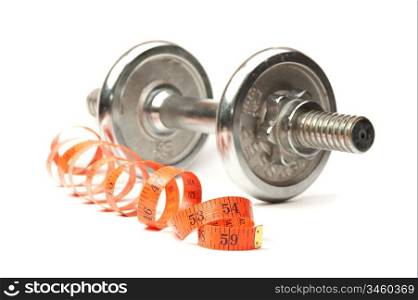 dumbbell and measuring tape isolated on white