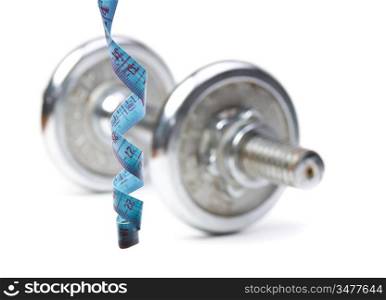 dumbbell and measuring tape. isolated on white