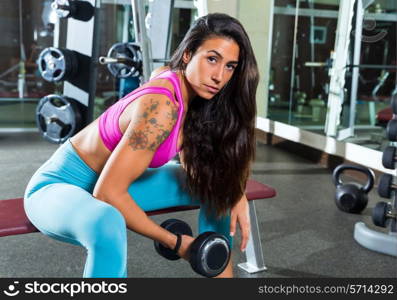 dumbbell concentrated biceps curl girl woman workout at gym exercise