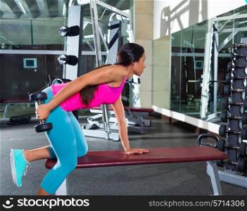 dumbbell triceps kickback girl workout exercise at gym
