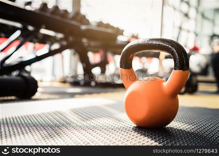 dumbbells and barbells with set of equipment for weightlifting in gym. dumbbells and barbells for weightlifting in gym