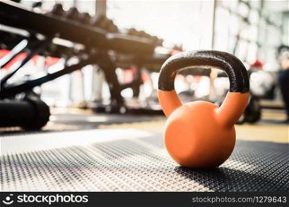 dumbbells and barbells with set of equipment for weightlifting in gym. dumbbells and barbells for weightlifting in gym
