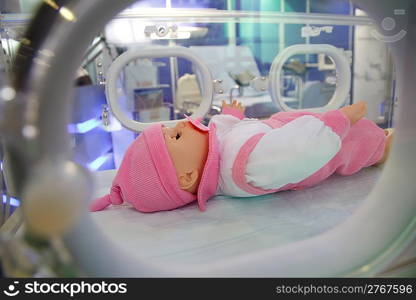 Dummy of child in medical box.