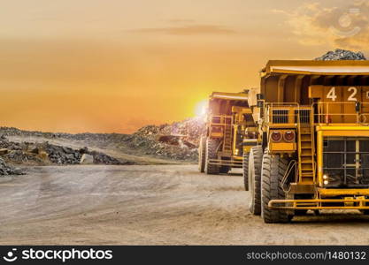 Dump Trucks transporting Platinum ore for processing