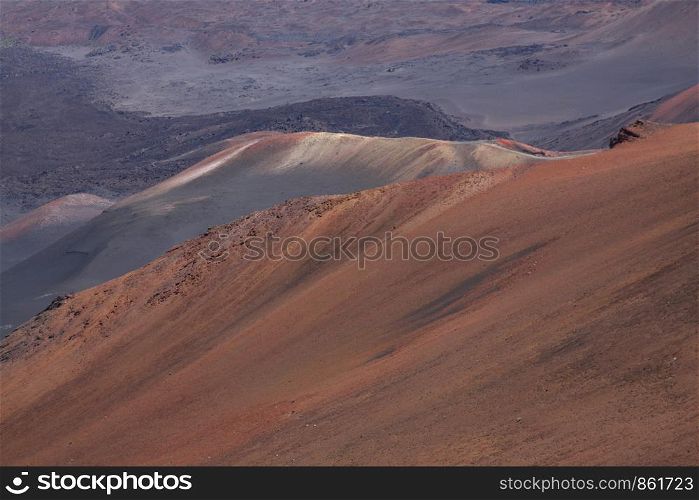 Dune of red rock with light play in stone desert