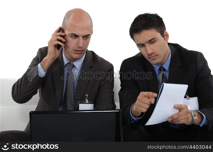 duo of businessmen working together