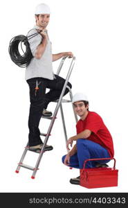 duo of electricians in studio