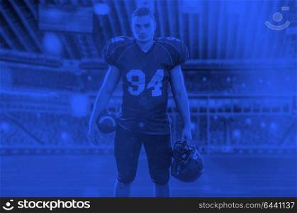 duo toned american football player in arena at night with stadium lights